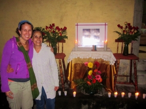 Lucky in front of her house with the altar for the procession of the seven pains of the virgin Mary.